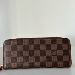 Louis Vuitton's classic Clémence Wallet 

7.9 x 3.5 x 0.8 inches
